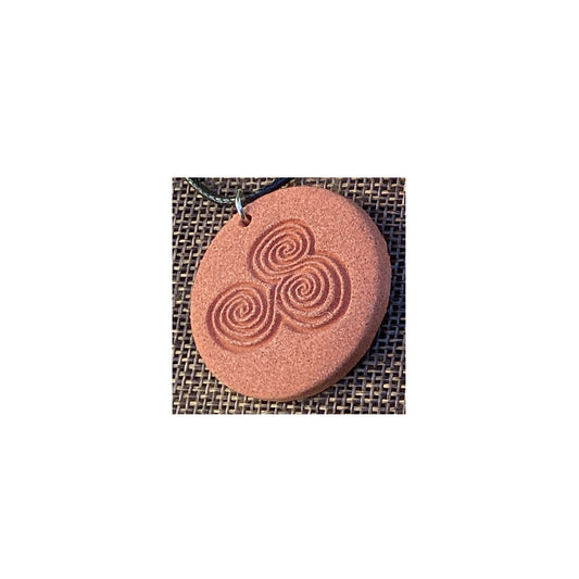 Megalithic Art Pendant with Triskele Design.