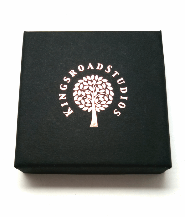 Presentation Box with copper foil Kingsroad Studios logo  Edit alt text