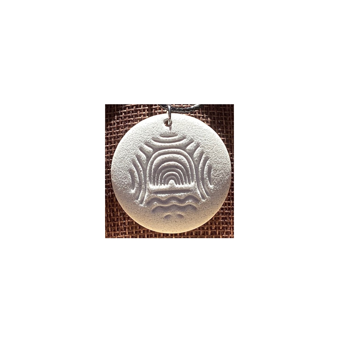Megalithic Art Pendant with Portal Design.